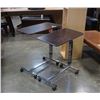 Image 1 : 2 ADJUSTABLE HEIGHT ROLLING  BEDSIDE TABLES