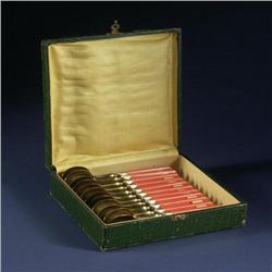 TWELVE GUELON FRENCH ICE CREAM SPOONS