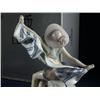 Image 2 : LLADRO SUNNING AT IPANEMA PORCELAIN FIGURINE 5660