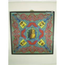 Asian framed screen printed fabric, yellow portraits with interturned red dragons on a green ground
