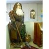 Image 2 : Wooden woodsman statue with lantern, walking stick and snowshoes.