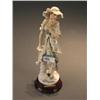 Image 2 : Guiseppe Armani cast resin figure of a woman holding a rose next to a short column. Marked 1992 Flor