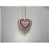 Image 1 : 10K yellow gold, ruby, and diamond heart pendant and chain. Ruby .60ctw Diamond .40ctw. Appraisal in