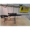 Image 1 : Mossberg 4X4 BA 300 Win Mag BL=24" Brand New In Box, Fluted Barrel, One Magazine, 3-9x40 Scope, Synt