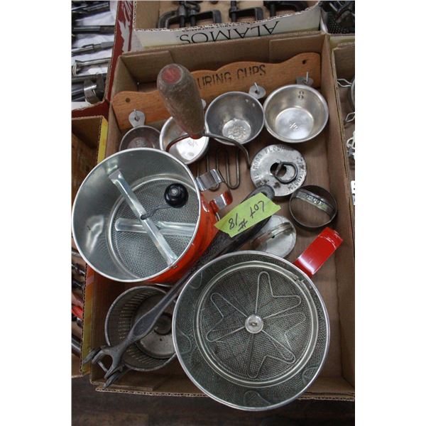 Box of Sifters, cookie cutters, measuring cups & juicer