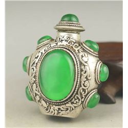 A SILVER INLAY GREEN JADE SNUFF BOTTLE QING DYNASTY.