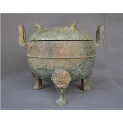 A BRONZE DOUBLE HANDEL BEAST TRIPOD CENSER MING DYNASTY.