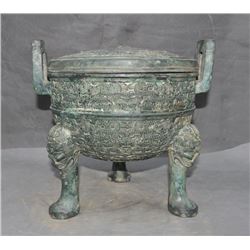 A BRONZE DOUBLE HANDEL BEAST TRIPOD CENSER MING DYNASTY.