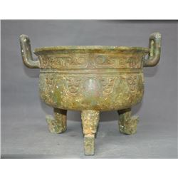 A BRONZE DOUBLE HANDEL BEAST TRIPOD CENSER MING DYNASTY.