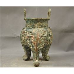 A BRONZE DOUBLE HANDEL TRIPOD CENSER MING DYNASTY.
