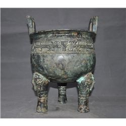 A BRONZE DOUBLE HANDEL BEAST TRIPOD CENSER MING DYNASTY.
