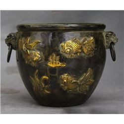 A BRONZE GILD FISH JAR MING DYNASTY.