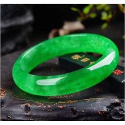 A CERTIFICATED NATURAL GREEN JADE BANGEL.