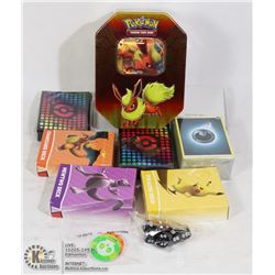 VARIOUS BOOSTER PACKS IN COLLECTORS TIN