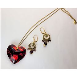 21)  GARNET RED TITANIUM HEART PENDANT ON