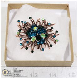 RHINESTONE FLOWER BURST BROOCH