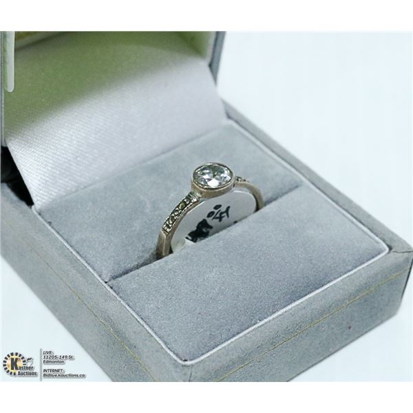 STERLING SILVER AND SWAROVSKI CRYSTAL RING SIZE 7.