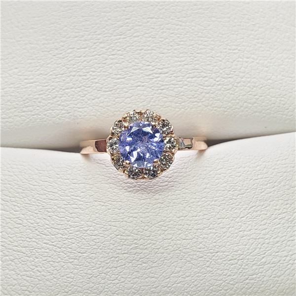 11) 14 KARAT ROSE GOLD TANZANITE AND DIAMOND RING.