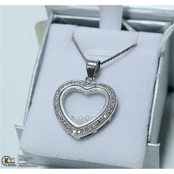 NEW. HEART PENDANT WITH FLOATING CRYSTALS
