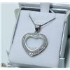 Image 1 : NEW. HEART PENDANT WITH FLOATING CRYSTALS