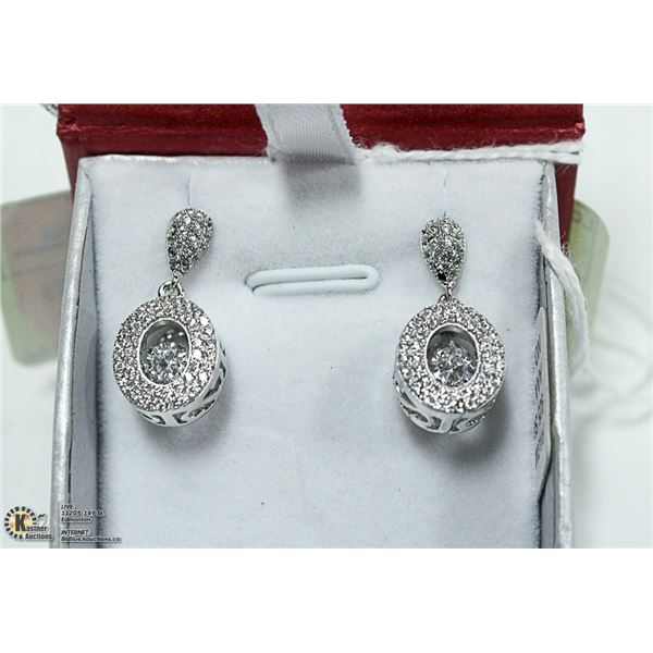 NEW. DANCING STONES, SET IN 925 SILVER 4.2 GRAMS