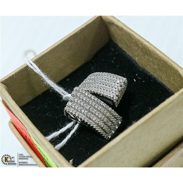 NEW. SILVER RING, SET WITH CZ'S. 9.4 GRAMS. SIZE