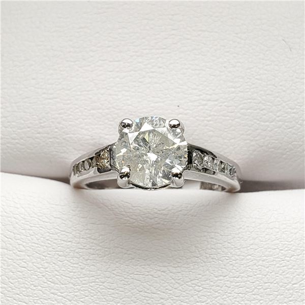 41) 14 KARAT WHITE GOLD DIAMOND RING