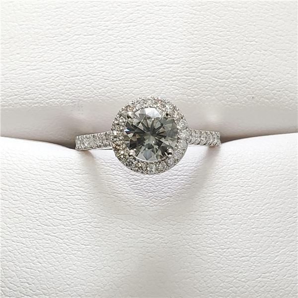 34) PLATINUM DIAMOND RING.