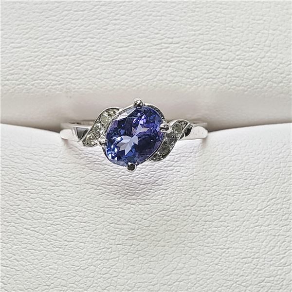 30) 10 KARAT WHITE GOLD TANZANITE AND DIAMOND RING