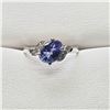 Image 1 : 30) 10 KARAT WHITE GOLD TANZANITE AND DIAMOND RING