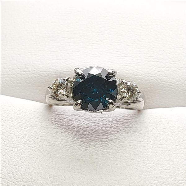 24) 10 KARAT WHITE GOLD BLUE DIAMOND RING.