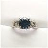 Image 1 : 24) 10 KARAT WHITE GOLD BLUE DIAMOND RING.