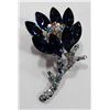 Image 1 : RHINESTONE FLOWER BROOCH WITH LARGE MARQUIS CUT