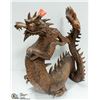 Image 1 : WOOD CARVED DRAGON STATUE WITH SOME DAMAGE