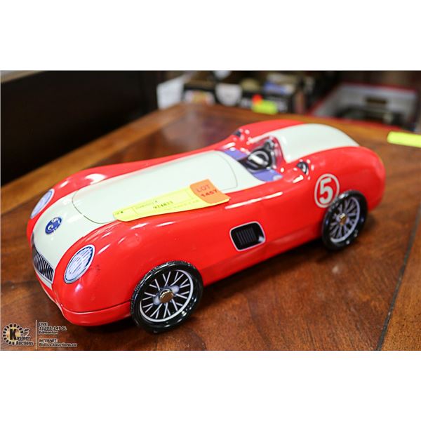 COLLECTIBLE TIN RACE CAR 10.5 INCHES LONG