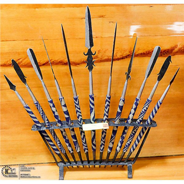 HANDMADE AFRICAN WEAPONS IN DISPLAY RACK