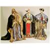 Image 1 : THREE COMPOSITION POLYCHROME PARCEL-GILT AND JEWEL DECORATED FREESTANDING WISEMEN