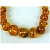 Image 3 : THREE AMBER COLORED BEADED NECKLACES