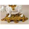 Image 2 : A NAPOLEON III ORMOLU-MOUNTED AND LACQUERED PORCELAIN RHINOCEROS FORM MANTLE CLOCK