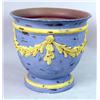 Image 1 : A PAINT-DECORATED CERAMIC FOOTED PLANTER