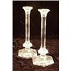 Image 2 : TWO PAIRS OF COLORLESS GLASS CANDLESTICKS