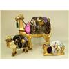 Image 1 : A GROUP OF THREE PAPER MACHE GILT AND JEWEL DECORATED CAMELS