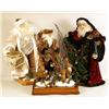 Image 1 : A GROUP OF THREE DECORATIVE SANTAS