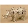 Image 5 : FOUR HAND-PAINTED PORCELAIN RHINOCEROSES