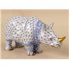 Image 6 : FOUR HAND-PAINTED PORCELAIN RHINOCEROSES