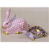 Image 1 : A HAND-PAINTED PINK-DECORATED PORCELAIN RABBIT