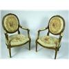 Image 1 : A PAIR OF LOUIS XVI STYLE CARVED GILTWOOD FAUTEUIL A LA RIENE