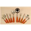 Image 1 : A PARTIAL ORANGE PLASTIC HANDLED STAINLESS STEEL FLATWARE SERVICE