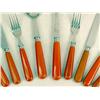Image 2 : A PARTIAL ORANGE PLASTIC HANDLED STAINLESS STEEL FLATWARE SERVICE