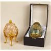Image 1 : A ROCK CRYSTAL GILT METAL AND FRESHWATER PEARL-MOUNTED EGG